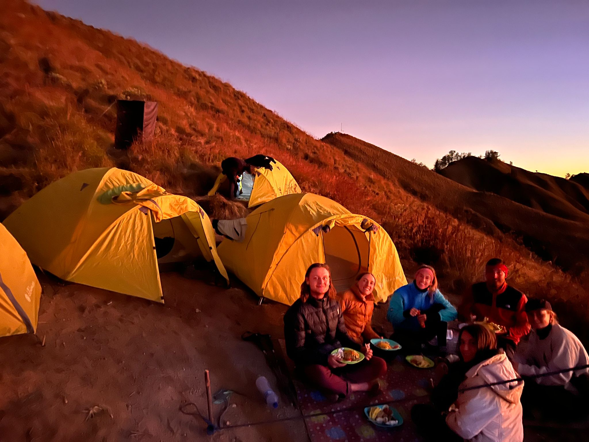 The crew preparing dinner at the trek camp in the evening